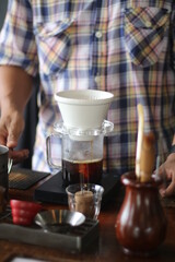 Fototapeta na wymiar Barista brewing coffee, method pour over, drip coffee