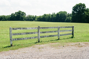 Fototapeta premium white fence in a field