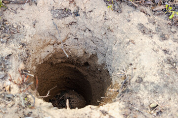 Deep pit in the ground. Digging a hole. Water Well Drilling, Dig a well for water, Groundwater hole...