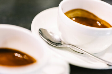 Details of Italian coffee in big cups.