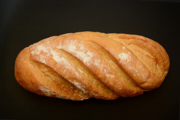 Homemade loaf of artisan baguette bread
