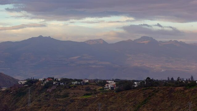 4K Timelapse Sequence of Quito, Ecuador - The mountains with houses in the ecuadorian capital from day to night