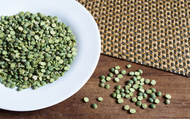 Raw split peas inside a white plate