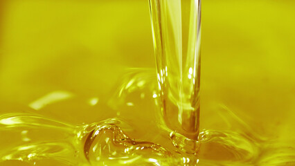 Pouring cooking oil, closeup