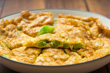 Sichuan-style home-cooked dishes - omelette with bitter gourd