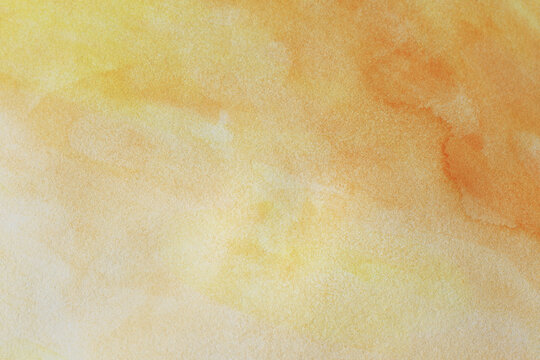 light yellow and orange hand painted watercolour background