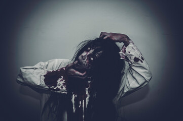 Portrait of asian woman make up ghost,Scary horror scene for background,Halloween festival...