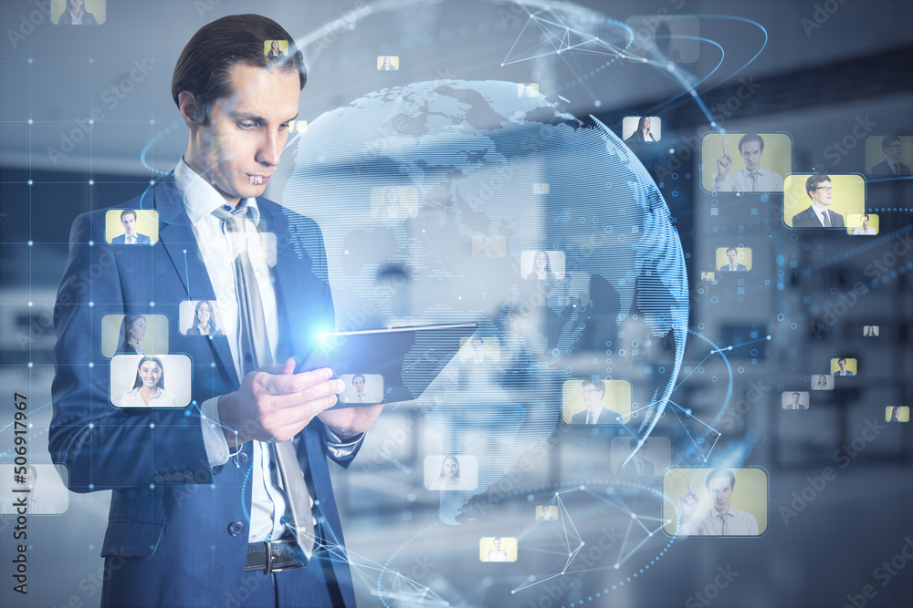 Poster global social network and business society concept with young man in suit using digital tablet and v