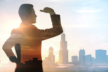 Look into the future and business development concept with handsome man silhouette looking at the...