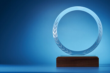 crystal trophy against blue background