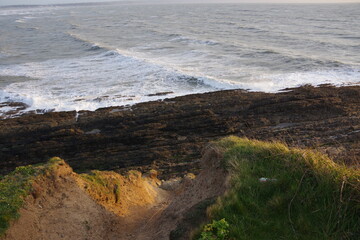 waves crashing on rocks