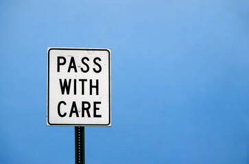 Sign. Arizona. USA. Pass with care.