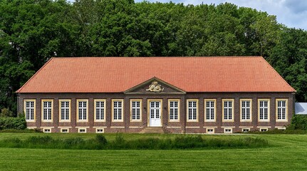 Fototapeta na wymiar View of the “Orangerie“ building. Nordkirchen Castle, North Rhine-Westphalia, Germany