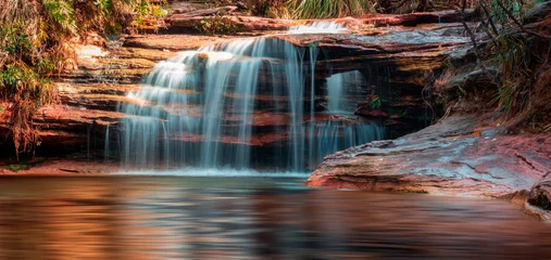 Fotobehang Chocoladebruin aguas claras rocky waterfall in brazil  © Icaro