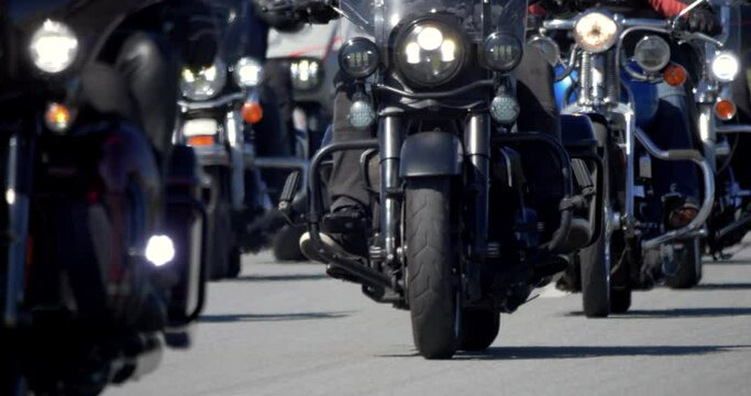 4K - Column of bikers riding on the road