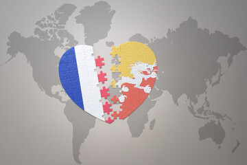 puzzle heart with the national flag of france and bhutan on a world map background. Concept.