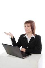 Happy woman using laptop and showing copy-space for product or advertisement text isolated on white  background