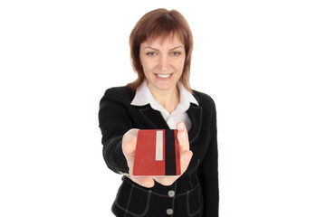 Cheerful businesswoman showing credit card isolated over white background