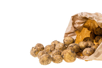 View of fresh potatoes in paper bag isolated on white background. First harvest. Sweden. 