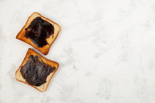 Hot toast for breakfast. Roasted Aussie savory toasts with vegemite. Vegemite is a very popular yeast based spread in Australia