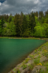 Fototapeta na wymiar Landscape near Banska Stiavnica town in sping fresh color morning with reservoir