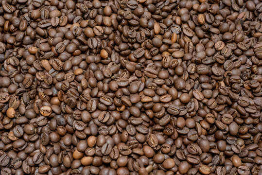 Coffee beans saturated color picture beautiful background. Roasted coffee beans background.