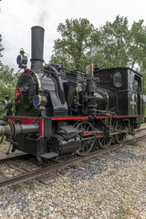 Obraz na płótnie Canvas Steam locomotive of Rhine Tourist Railway in spring.