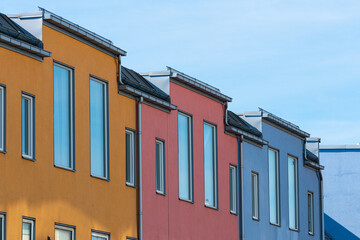 Colourful facades of apartment buildings.