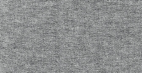 Vector fabric texture. Distressed texture of weaving fabric. Grunge background. Abstract halftone vector illustration. Overlay to create interesting effect and depth. Black isolated on white. EPS10.