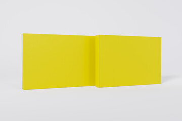 Mockup of a rectangular book with a blank glossy yellow cover on white background. Front and back cover visible. Isolated with clipping path.	