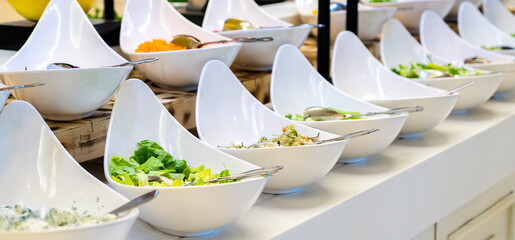 Salad bar with vegetables in restaurant. Healthy food concept