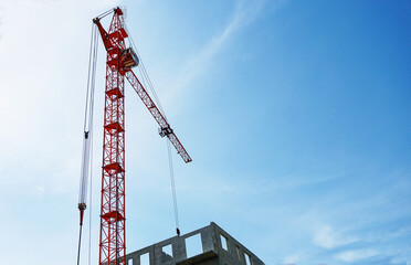 A crane that builds multi-story homes
