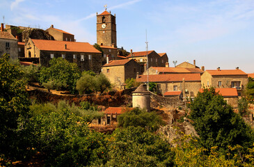 View of the Torre de Lucano tower and the stone houses of the medieval part of Monsanto in western Portugal