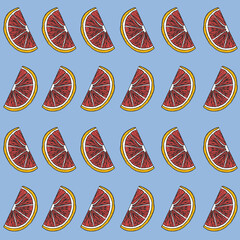 Pattern with grapefruit slices on blue background