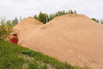 Mountains of sand at the construction site.