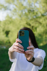 person taking a picture of themselves with a phone