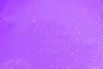 Abstract violet trendy backdrop. Sparkling background with bubbles. Festive blurred backdrop