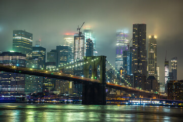 Fototapeta na wymiar Brooklyn Bridge and Manhattan at night