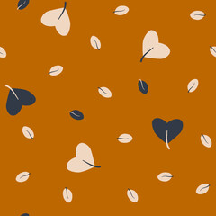 Seamless pattern with heart-shapes leave on an orange background