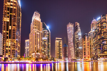Fototapeta na wymiar Illuminated Dubai Marina at Dusk, United Arab Emirates