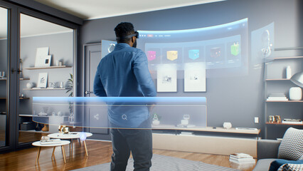 African American man wearing VR glasses uses NFT interface in virtual cyberspace metaverse space