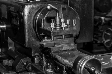  Metalworking workshop, metal processing machines.  Vintage Industrial Machinery in a old factory - black and white photo