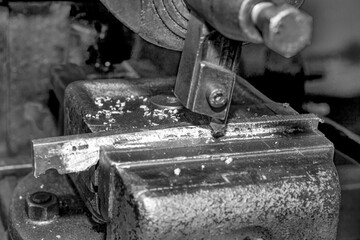  Metalworking workshop, metal processing machines.  Vintage Industrial Machinery in a old factory - black and white photo