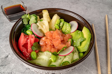 Fresh salad with vegetables and salmon