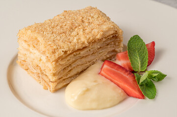 Piece of cake with fruit decoration