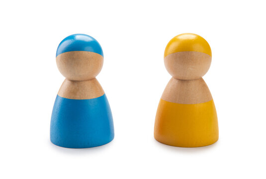 wooden figurines in the colors of the ukrainian flag isolated on a white background
