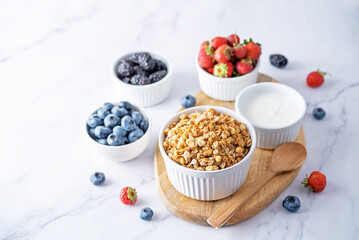 Oatmeal granola with berries in a bowl