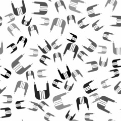 Black Air headphones icon icon isolated seamless pattern on white background. Holder wireless in case earphones garniture electronic gadget. Vector