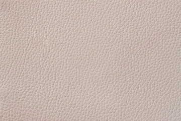 Texture of genuine leather, warm taupe color, background, pattern for backdrop
