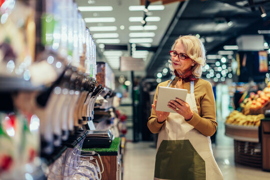 Woman working at a grocery store